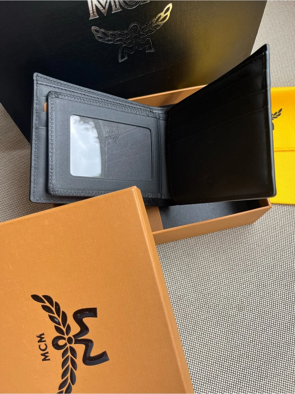 MCM Black Leather Bi-Fold wallet. 💯 authentic